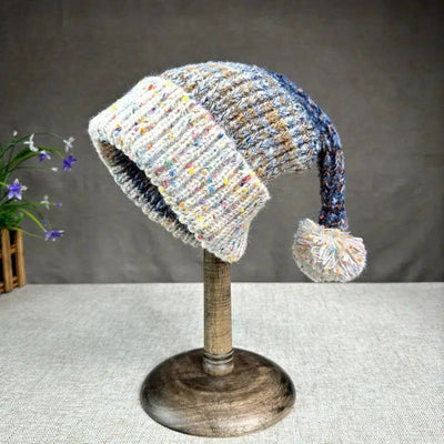 Bonnet de Noël™ | Élégance festive en laine, accessoire incontournable.