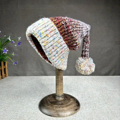 Bonnet de Noël™ | Élégance festive en laine, accessoire incontournable.