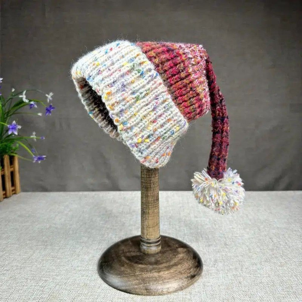 Bonnet de Noël™ | Élégance festive en laine, accessoire incontournable.